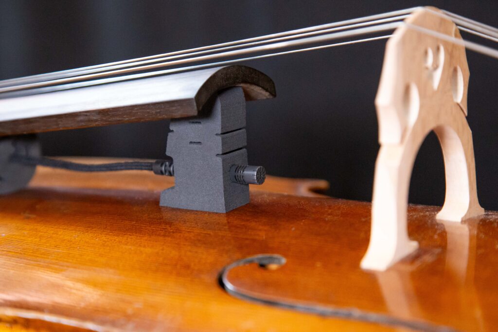 REMIC CE7000 RESHAPE cello mount used with the RE7200 microphone.